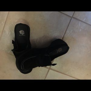 Women’s black clogs
